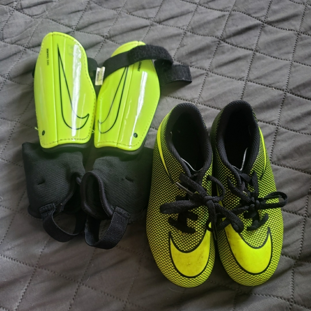 Kids soccer cleats and shin guards